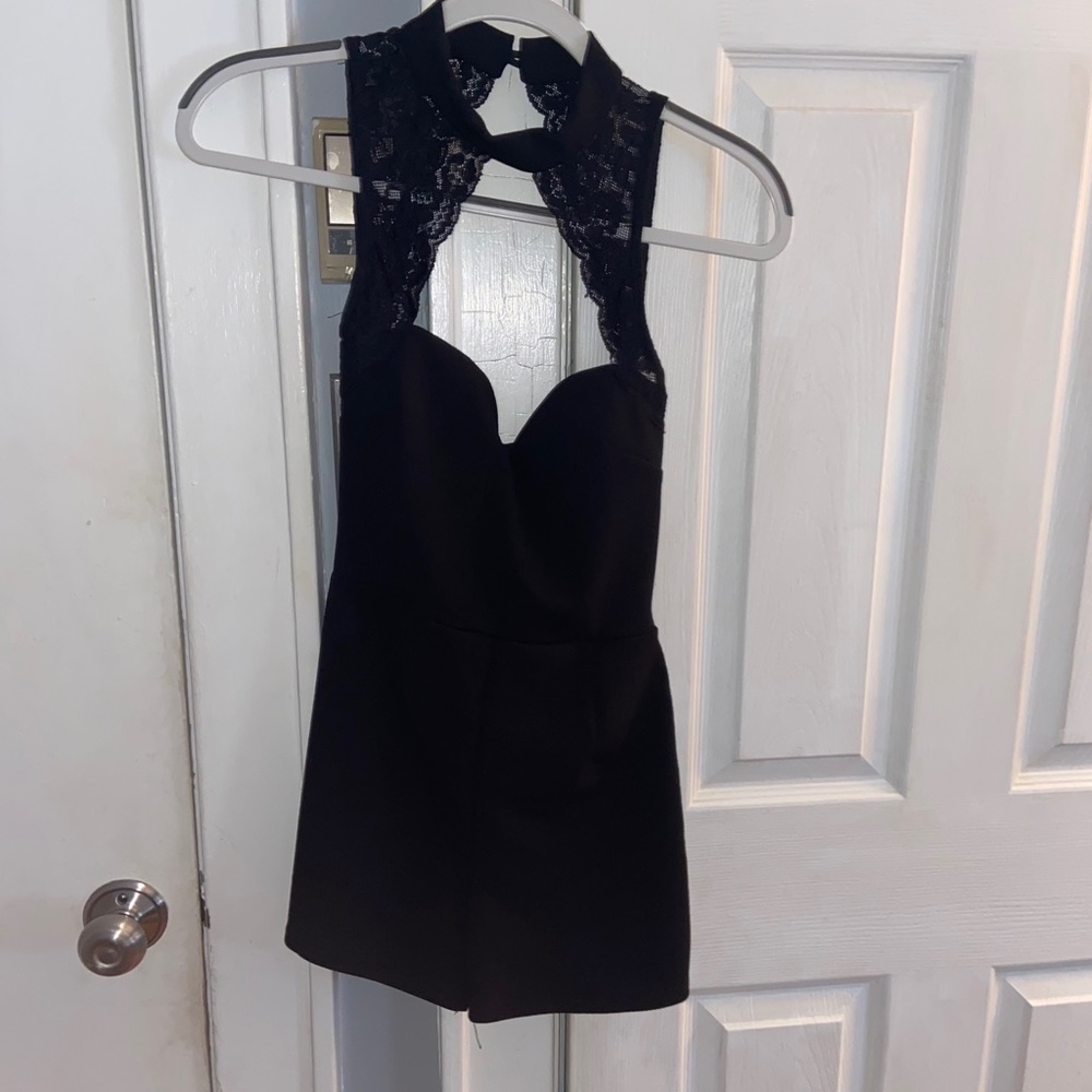 Black short jumpsuit with lace details
